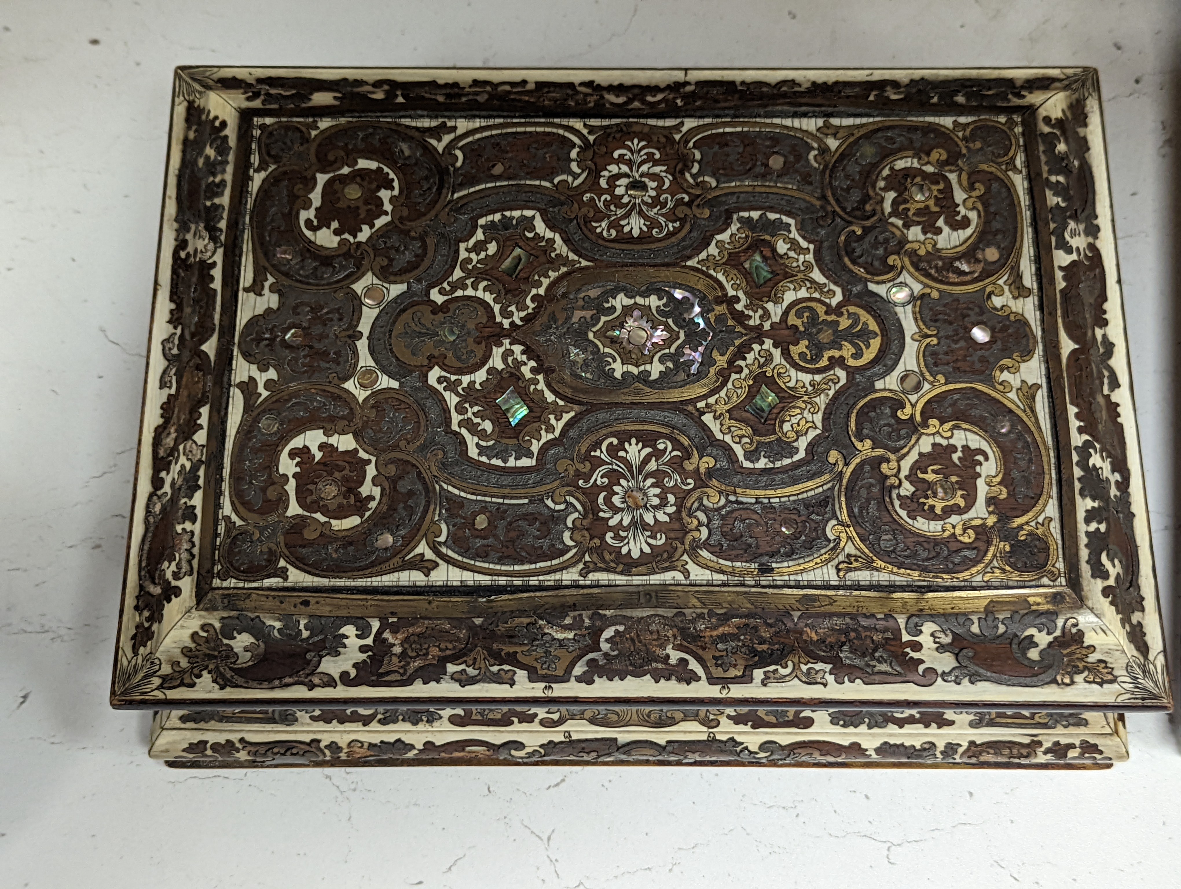 A 19th century French cut brass pewter and ivory inlaid jewellery box, h 10cm, 27 x 19cm, together with a parquetry box (2)